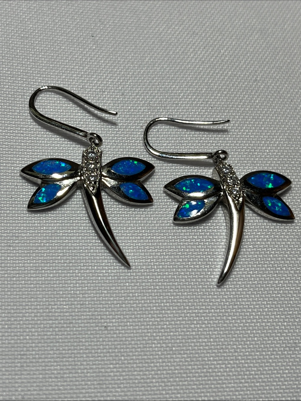 Sterling Silver Dragonfly Earrings with Fire Blue Opal Inlay
New
Dangle. Gift